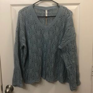 Blue sweater with bell sleeves